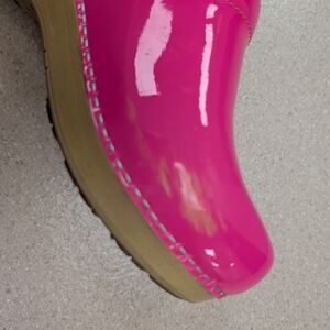 Dansko Hot Pink Patent Leather Clogs.